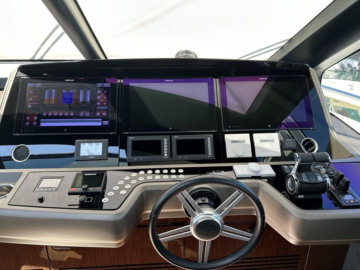 a car with a screen and buttons aboard K NUK Yacht for Sale