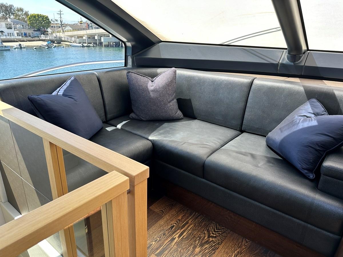a couch on a deck aboard K NUK Yacht for Sale