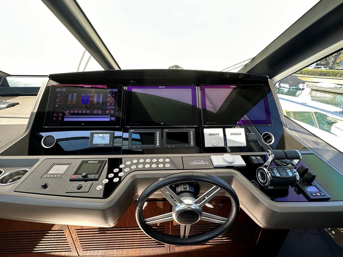 a car on the road aboard K NUK Yacht for Sale