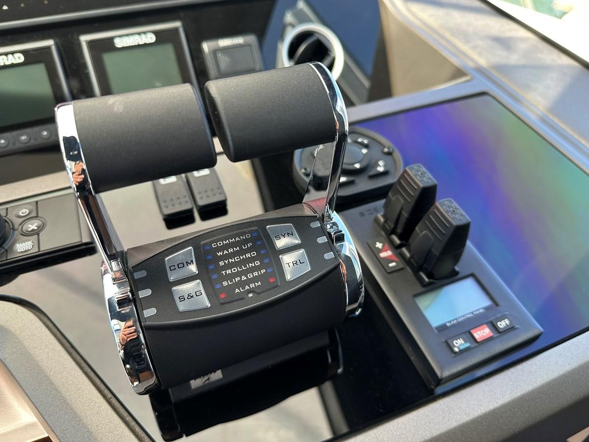 a car with a radio inside aboard K NUK Yacht for Sale