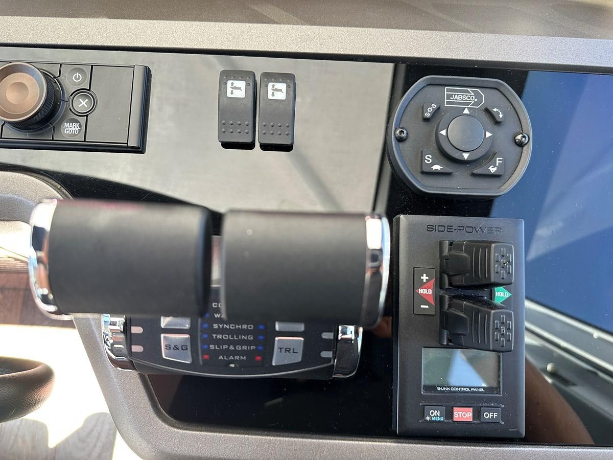 a close-up of a car stereo aboard K NUK Yacht for Sale