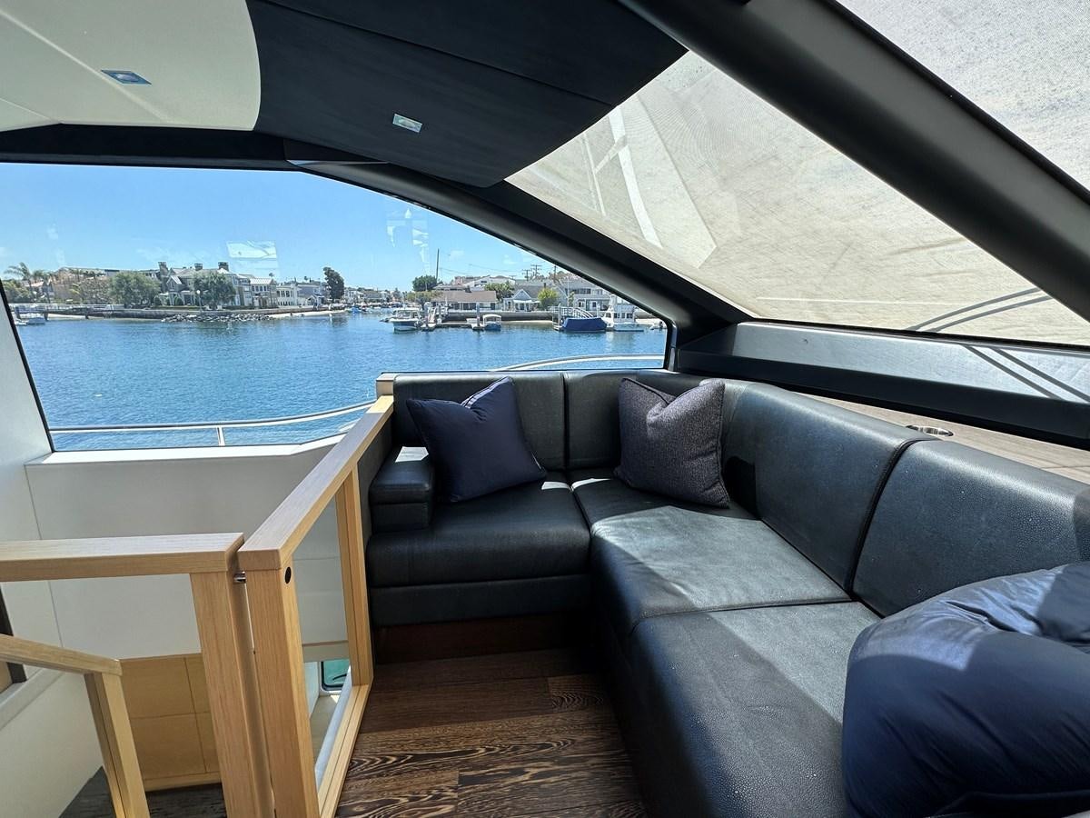 a couch and a table on a boat aboard K NUK Yacht for Sale