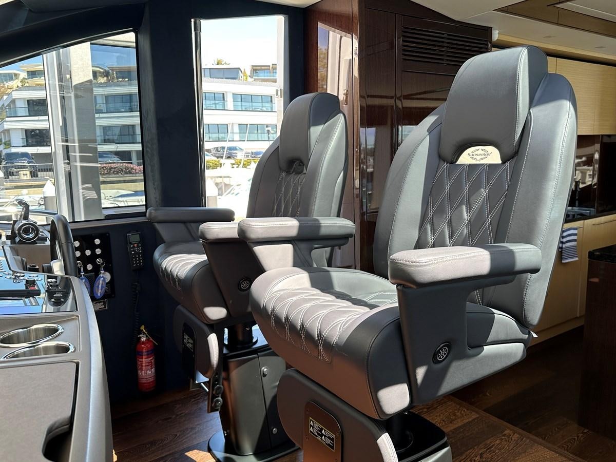 a room with a chair and a desk aboard K NUK Yacht for Sale