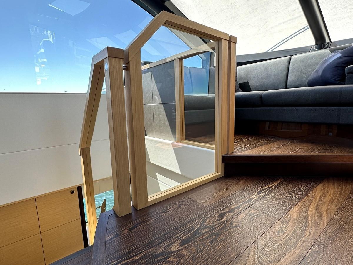 a glass door in a room aboard K NUK Yacht for Sale