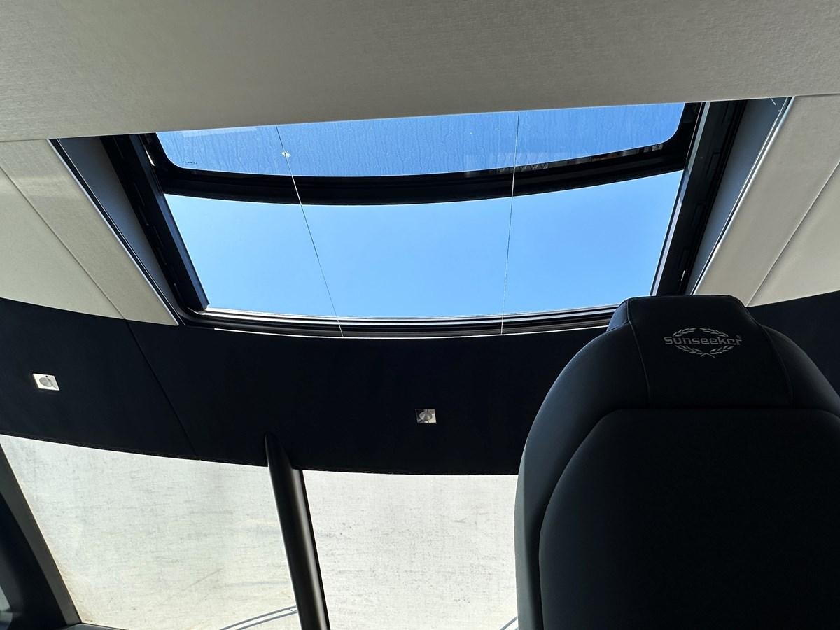 a couple of black seats in a vehicle aboard K NUK Yacht for Sale