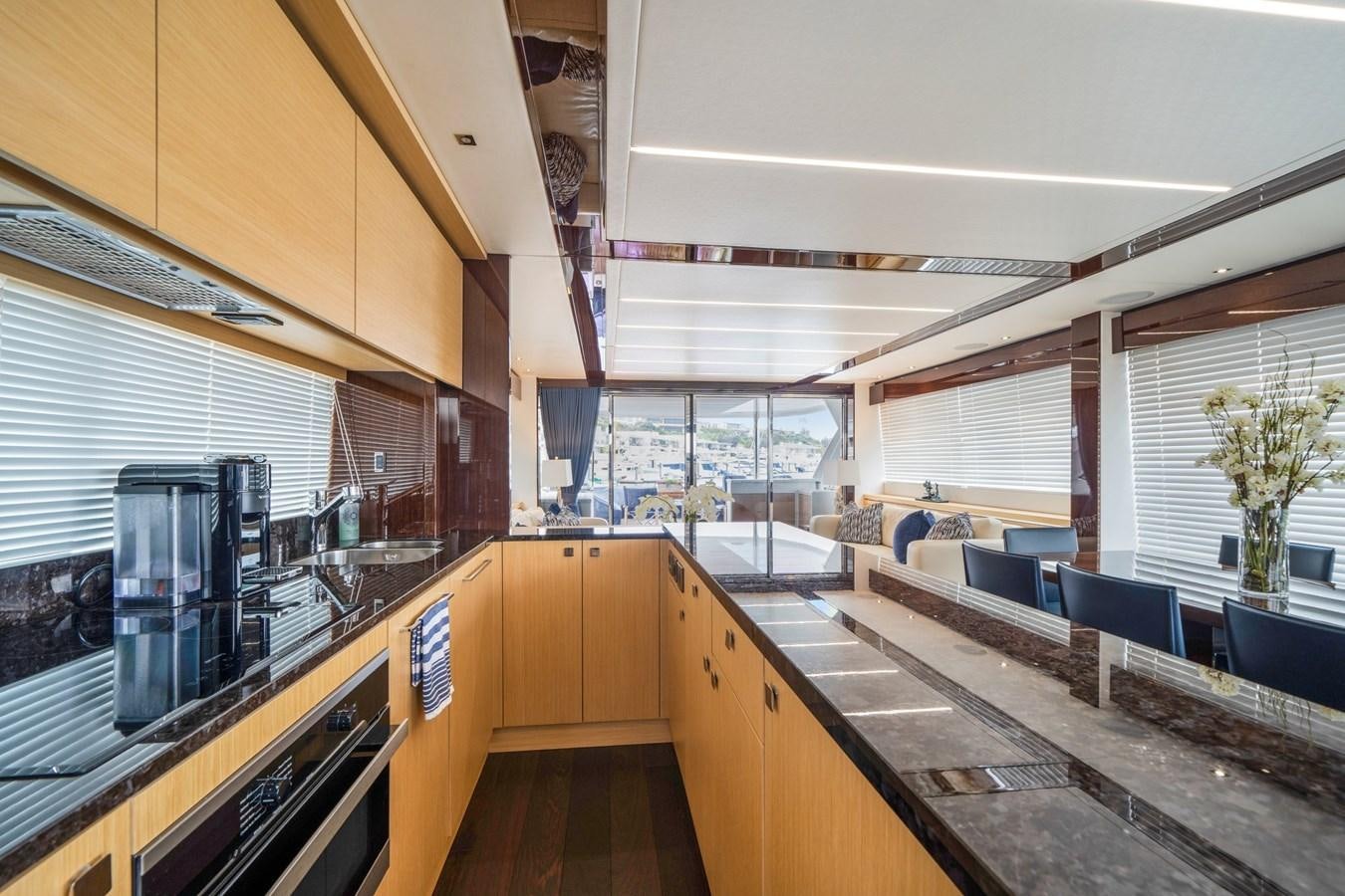 a modern looking kitchen with a large open floor plan aboard K NUK Yacht for Sale