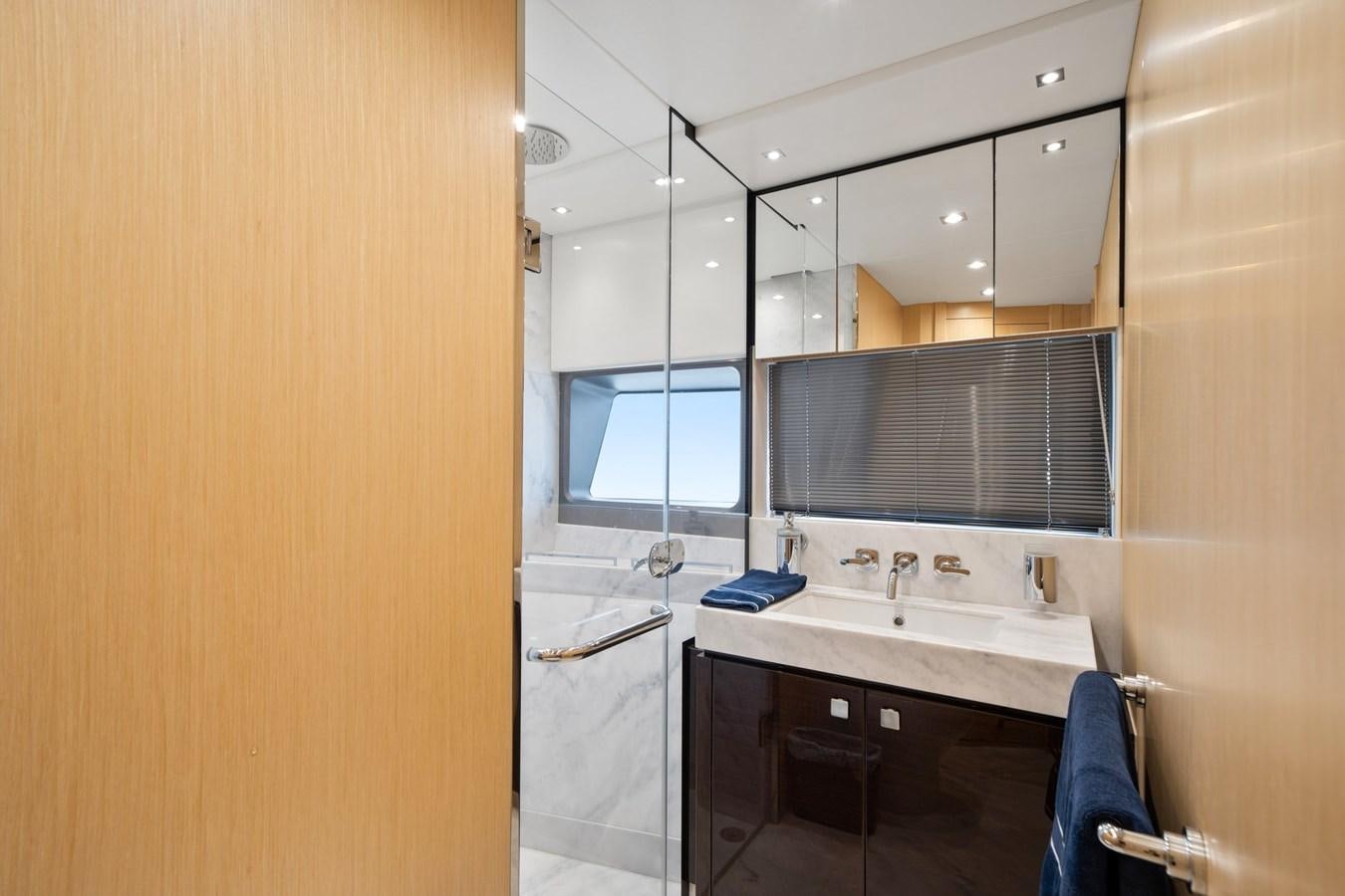 a bathroom with a sink and a shower unit aboard K NUK Yacht for Sale