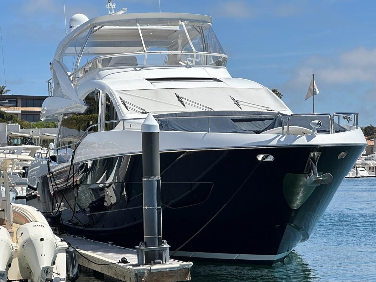 a boat docked at a pier aboard K NUK Yacht for Sale