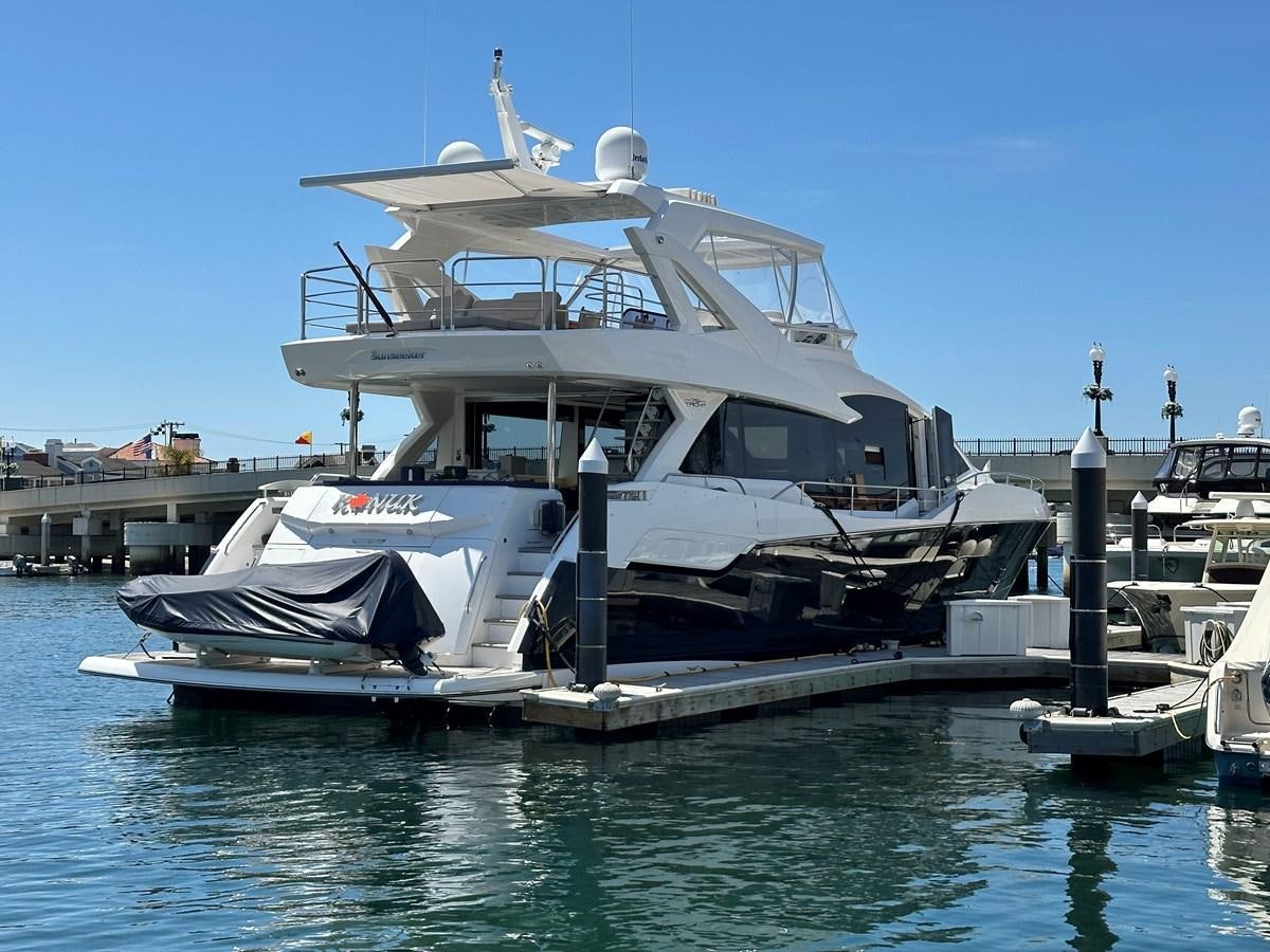 a boat docked at a pier aboard K NUK Yacht for Sale