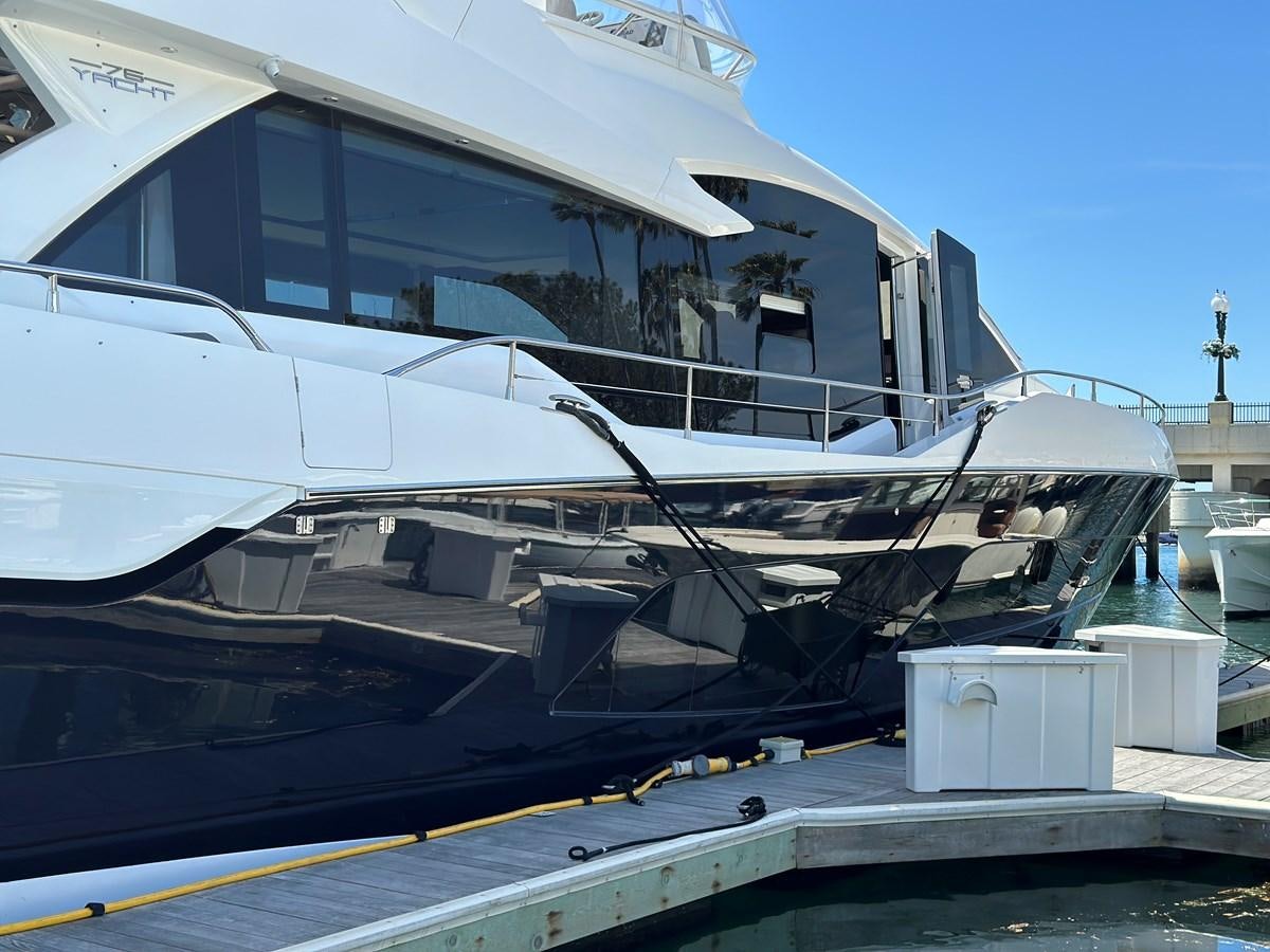 a large white boat aboard K NUK Yacht for Sale
