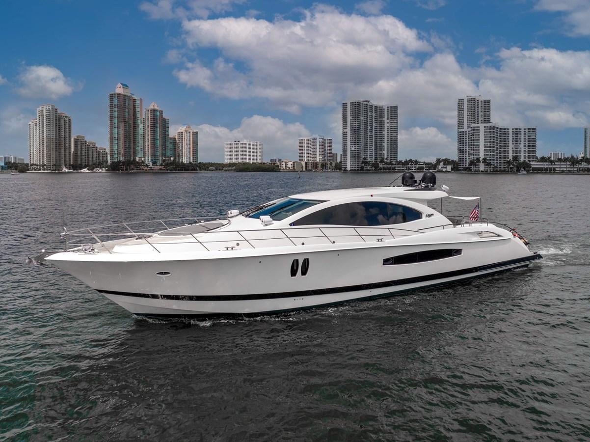 a white boat in the water aboard XCELL Yacht for Sale