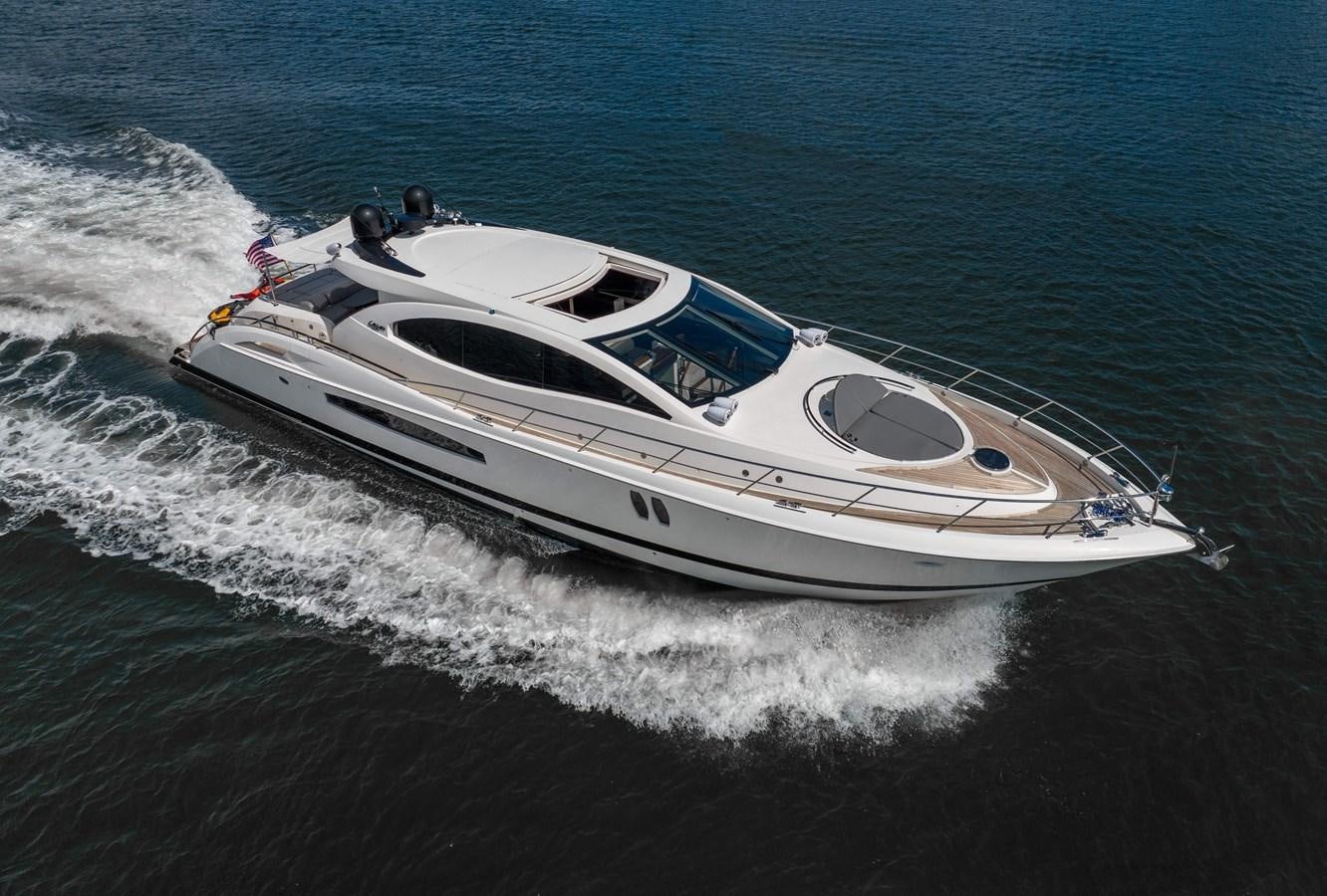 a white yacht on the water aboard XCELL Yacht for Sale