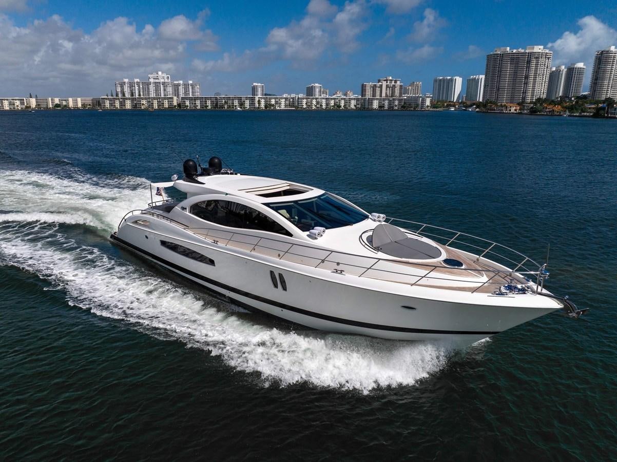 a white yacht on the water aboard XCELL Yacht for Sale