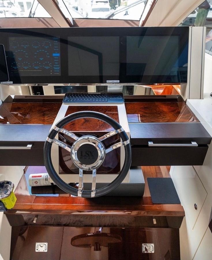 a fan on a table aboard XCELL Yacht for Sale