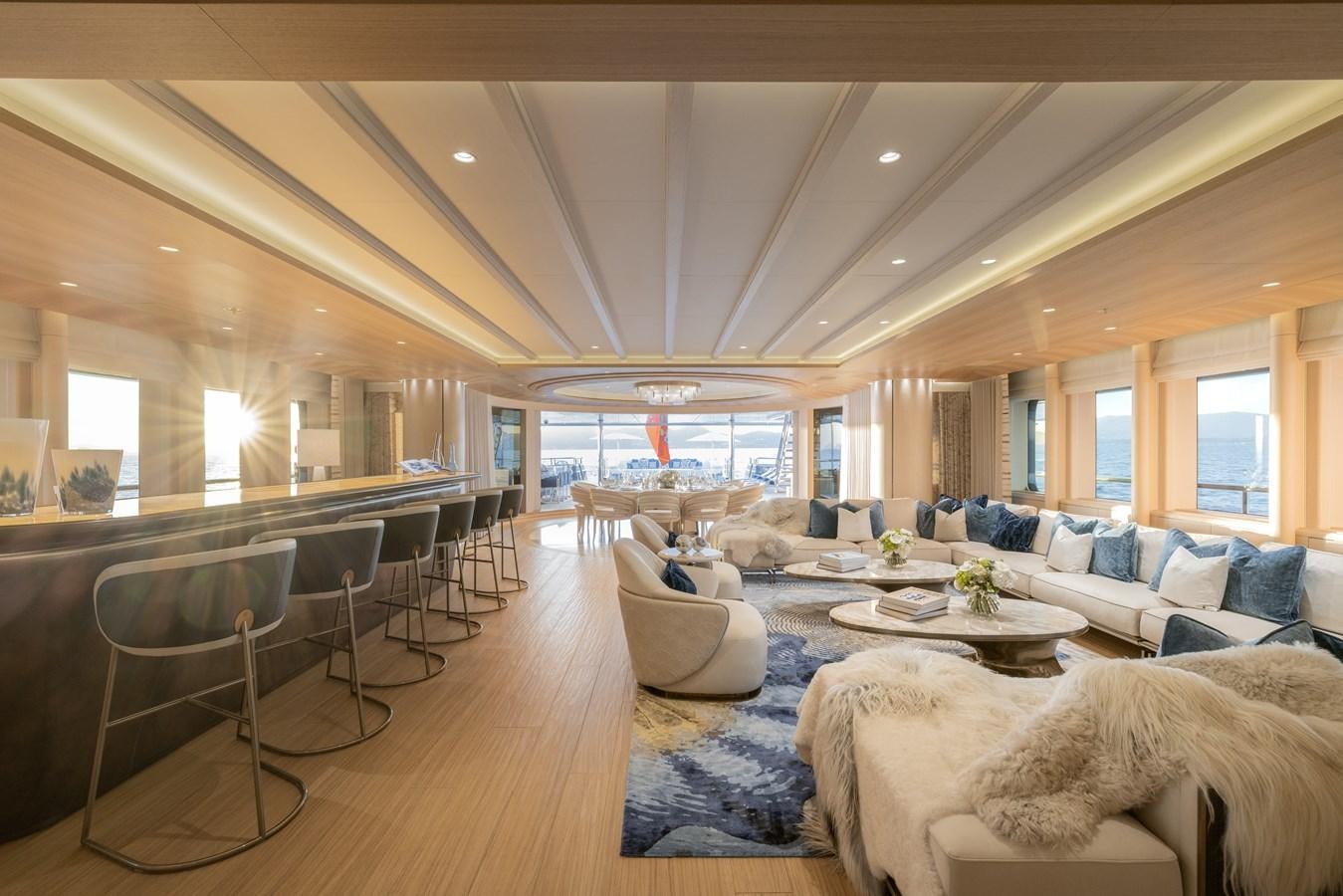 a living room with a large window aboard HERE COMES THE SUN Yacht for Sale