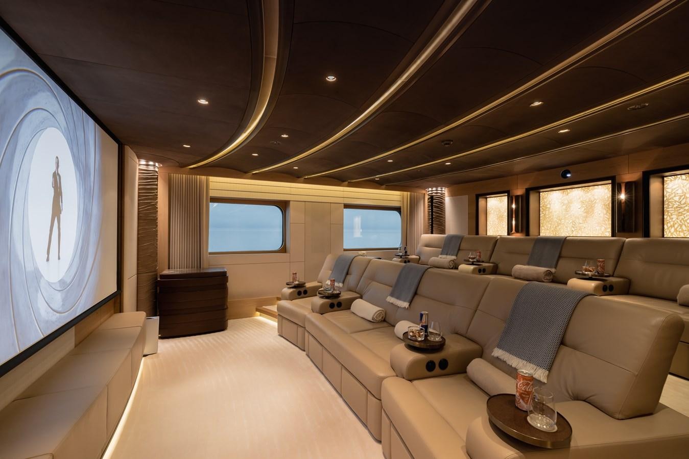 a room with a large screen aboard HERE COMES THE SUN Yacht for Sale