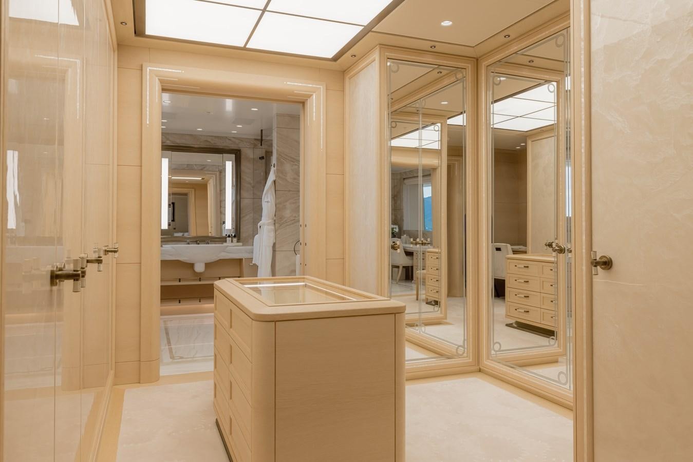 a bathroom with a large mirror aboard HERE COMES THE SUN Yacht for Sale