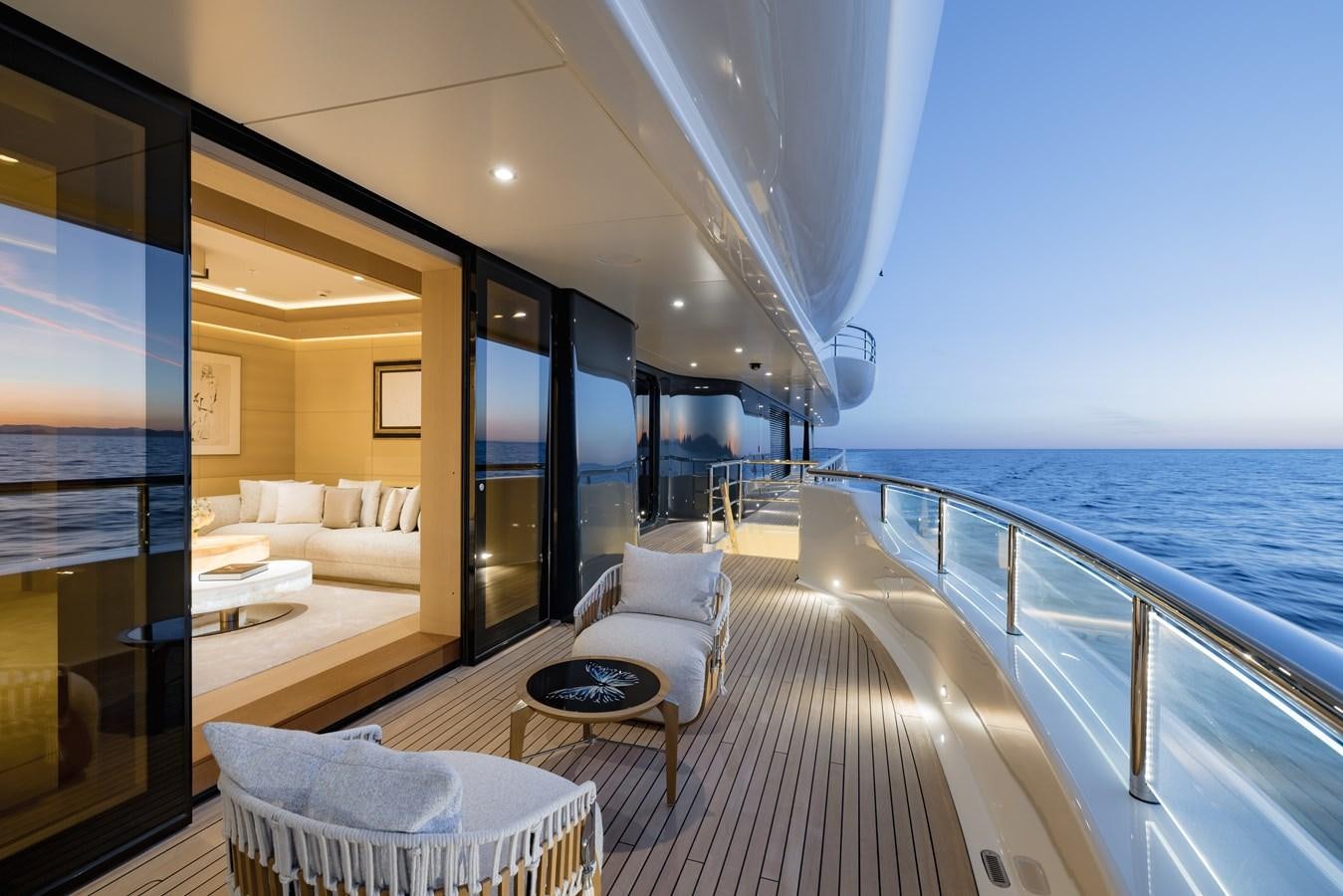 a large balcony overlooking a beach aboard HERE COMES THE SUN Yacht for Sale