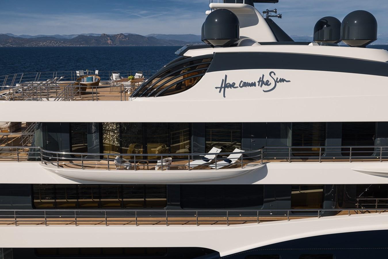 a large yacht docked aboard HERE COMES THE SUN Yacht for Sale