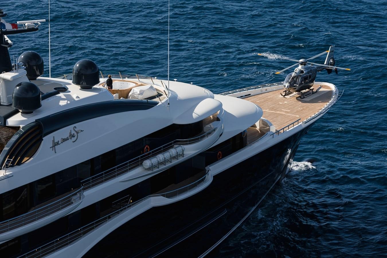 a boat with a motor attached to it aboard HERE COMES THE SUN Yacht for Sale