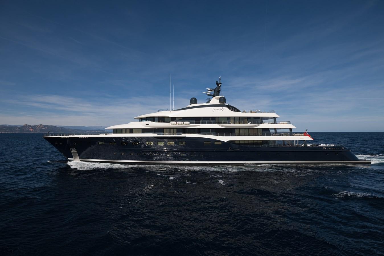 a large cruise ship in the water aboard HERE COMES THE SUN Yacht for Sale