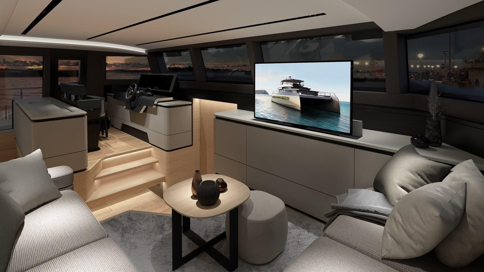 a room with a couch and a table and a tv aboard SERENITY 72 POWER CATAMARAN Yacht for Sale