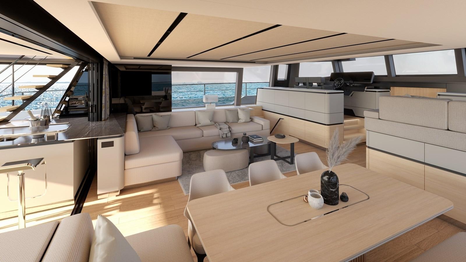 a room with a couch and a table aboard SERENITY 72 POWER CATAMARAN Yacht for Sale