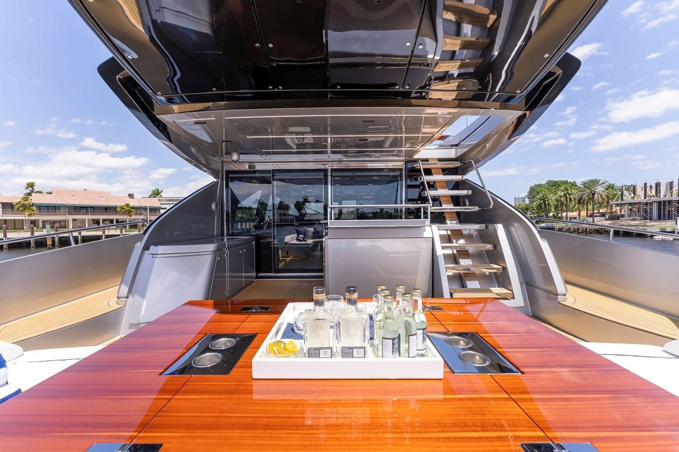 a table with a group of people on it aboard PERRI BEACH Yacht for Sale