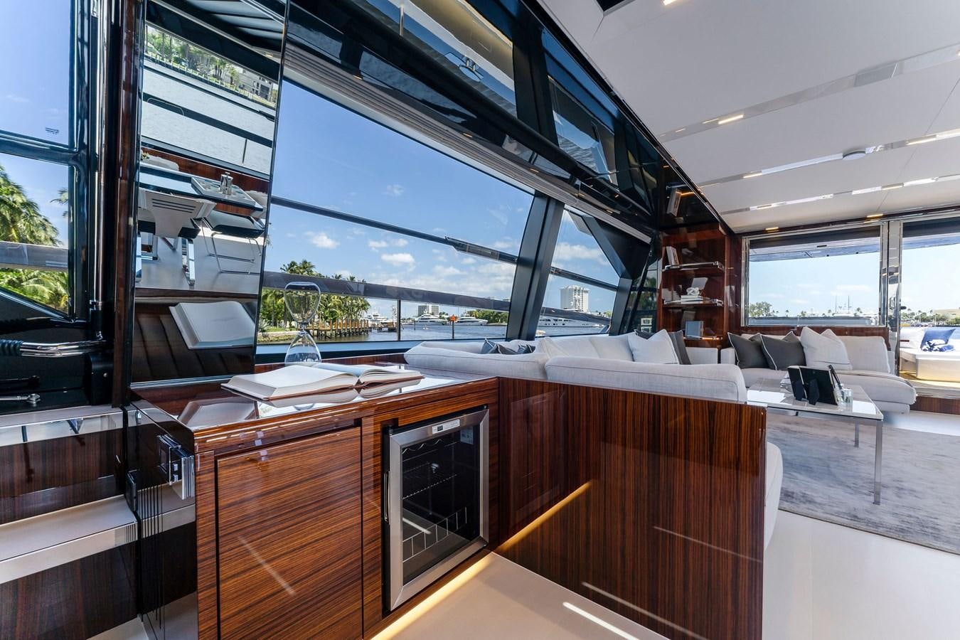 a room with a desk and chairs aboard PERRI BEACH Yacht for Sale