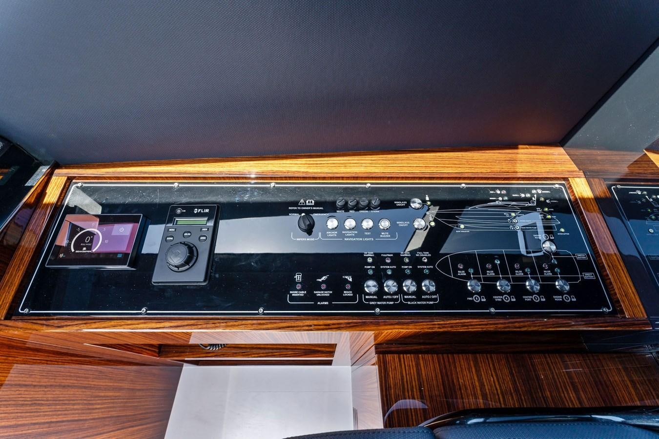 a black electronic device aboard PERRI BEACH Yacht for Sale