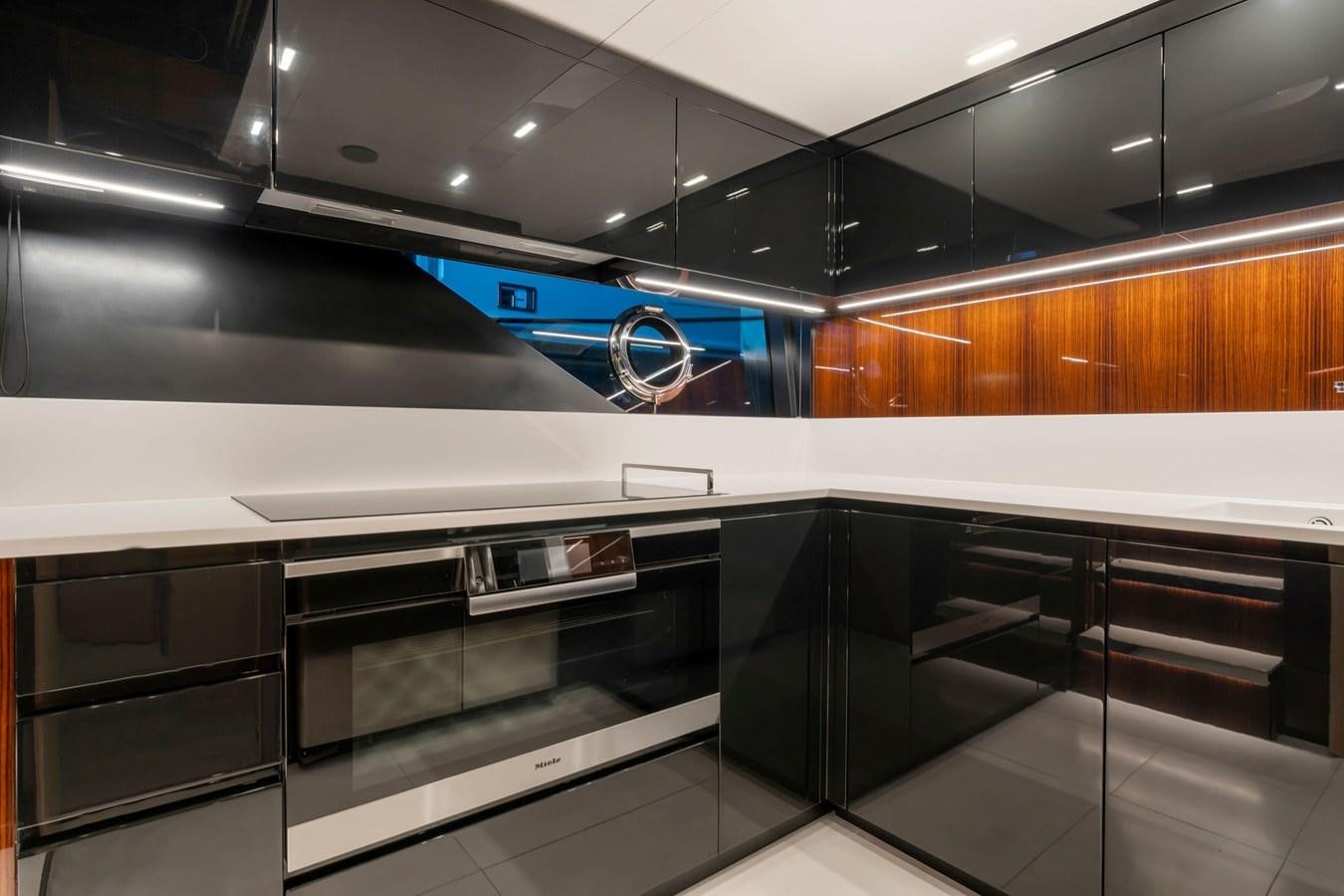 a kitchen with a large oven aboard PERRI BEACH Yacht for Sale