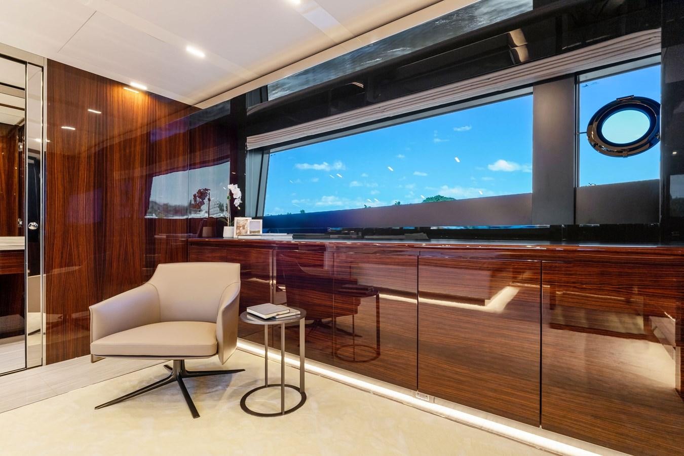a room with a large screen aboard PERRI BEACH Yacht for Sale