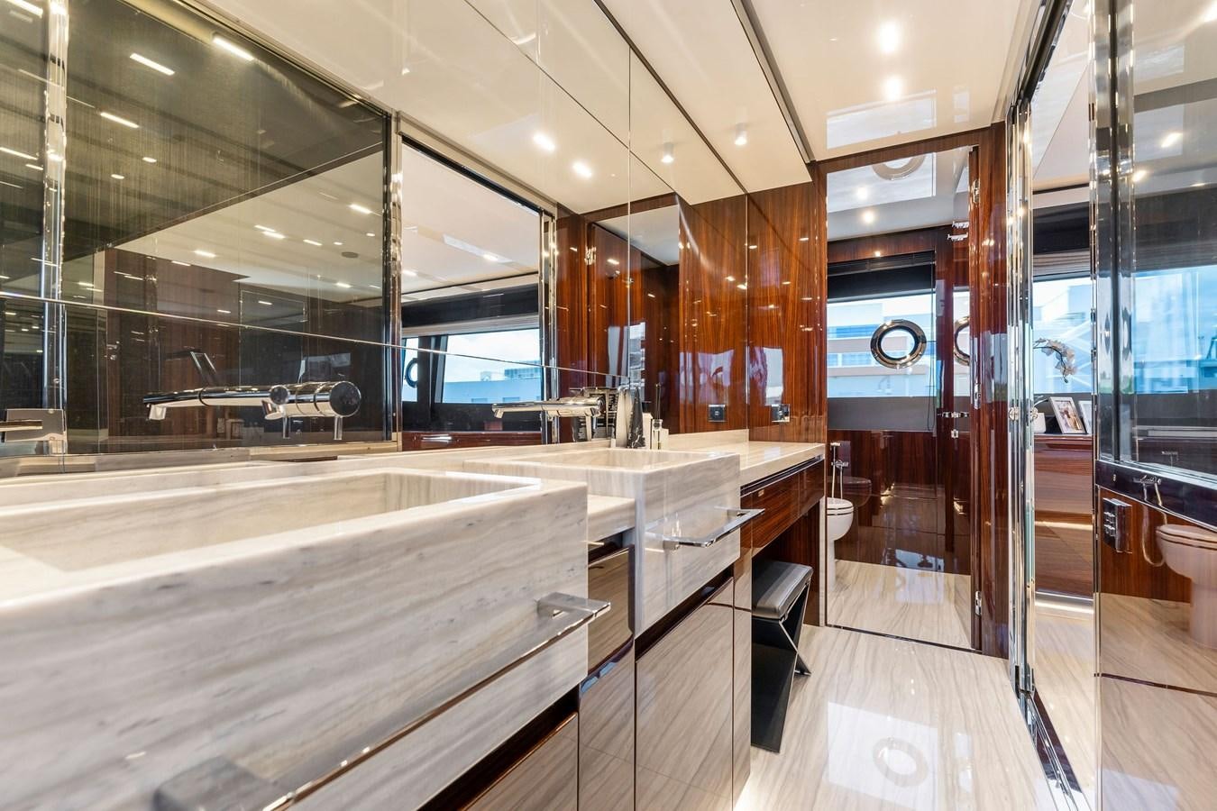 a large room with glass walls aboard PERRI BEACH Yacht for Sale