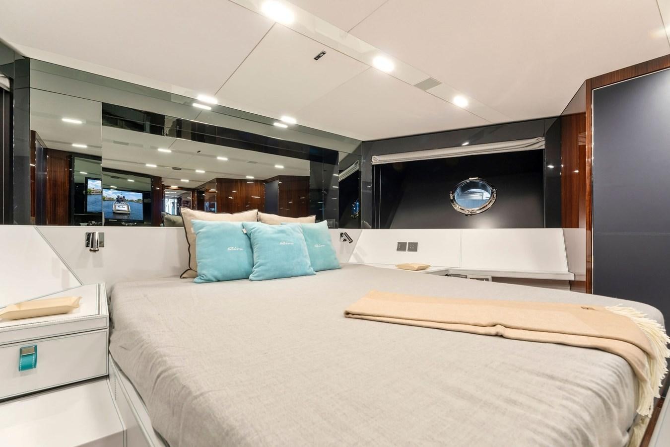 a large bedroom with a large bed aboard PERRI BEACH Yacht for Sale