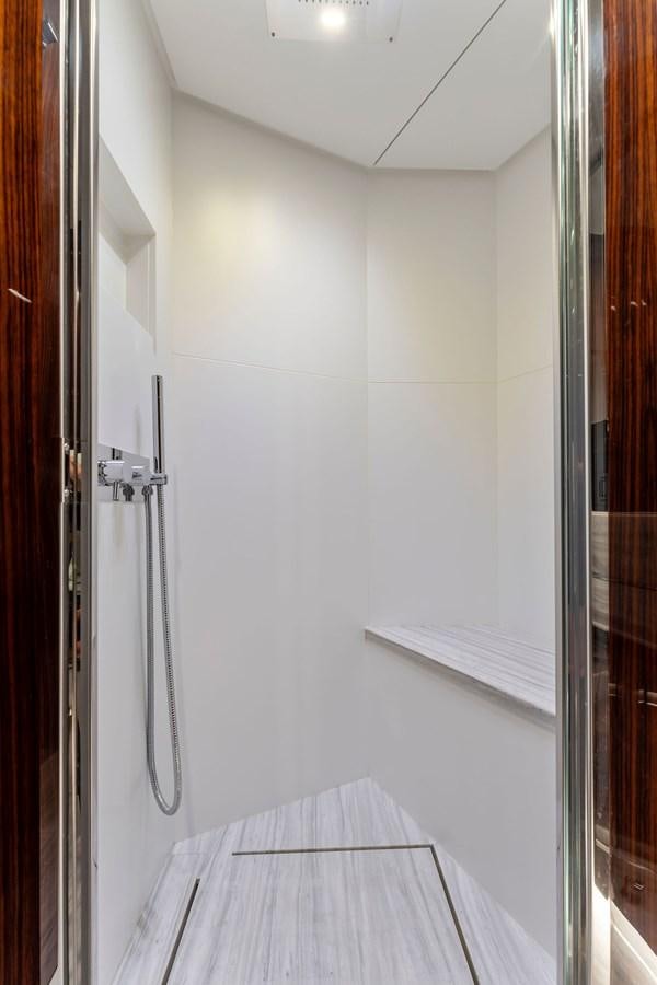 a white wall with a table and a white table aboard PERRI BEACH Yacht for Sale