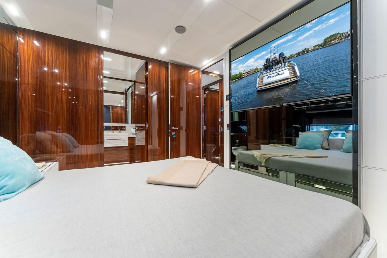 a room with a bed and a desk aboard PERRI BEACH Yacht for Sale