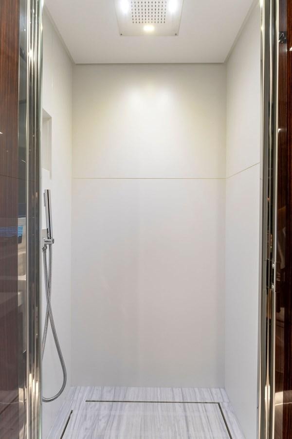 a white wall with a light switch aboard PERRI BEACH Yacht for Sale