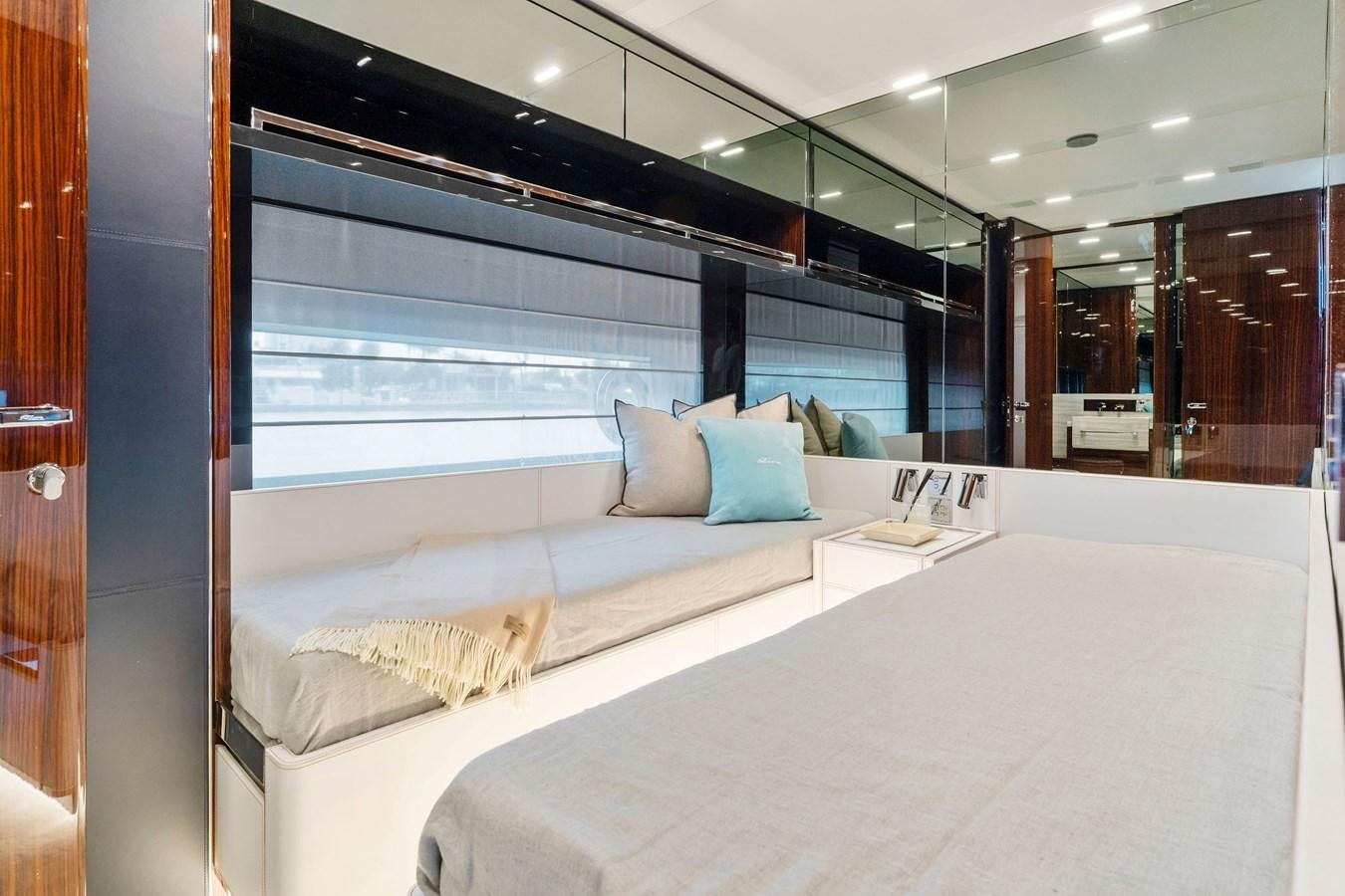 a room with a bed and a window aboard PERRI BEACH Yacht for Sale