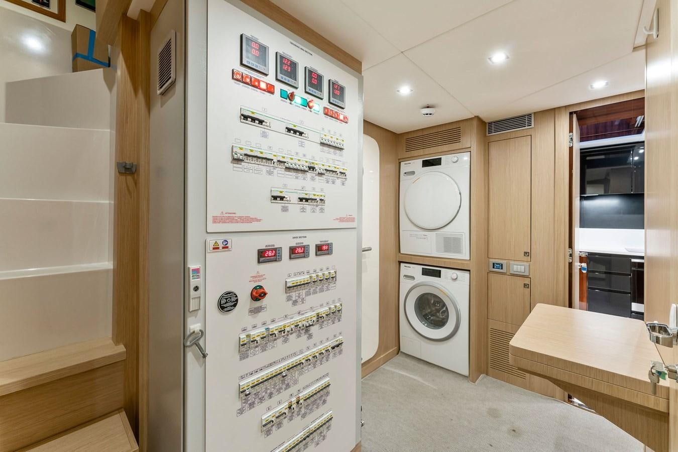 a refrigerator in a kitchen aboard PERRI BEACH Yacht for Sale