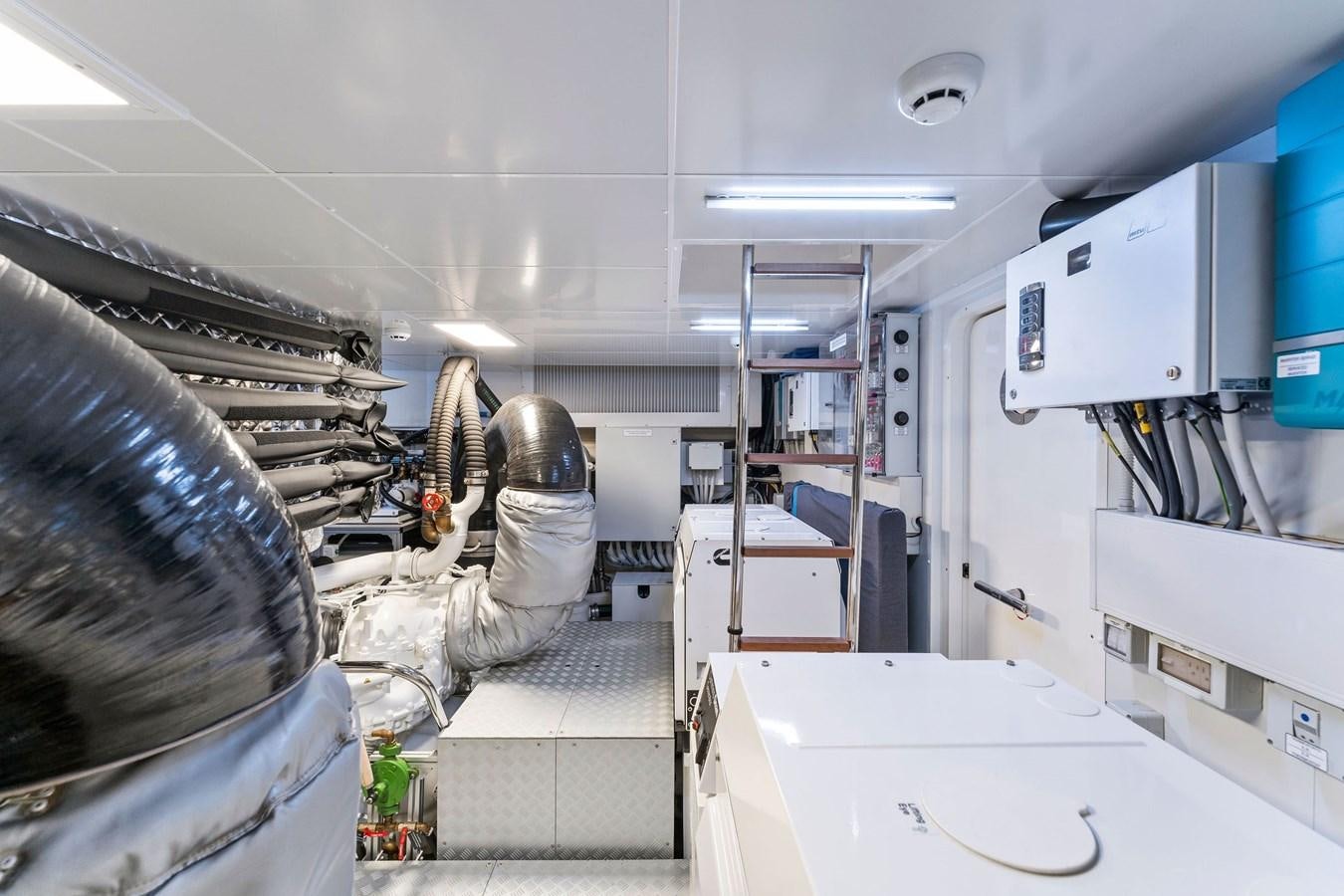 a few people in a room aboard PERRI BEACH Yacht for Sale