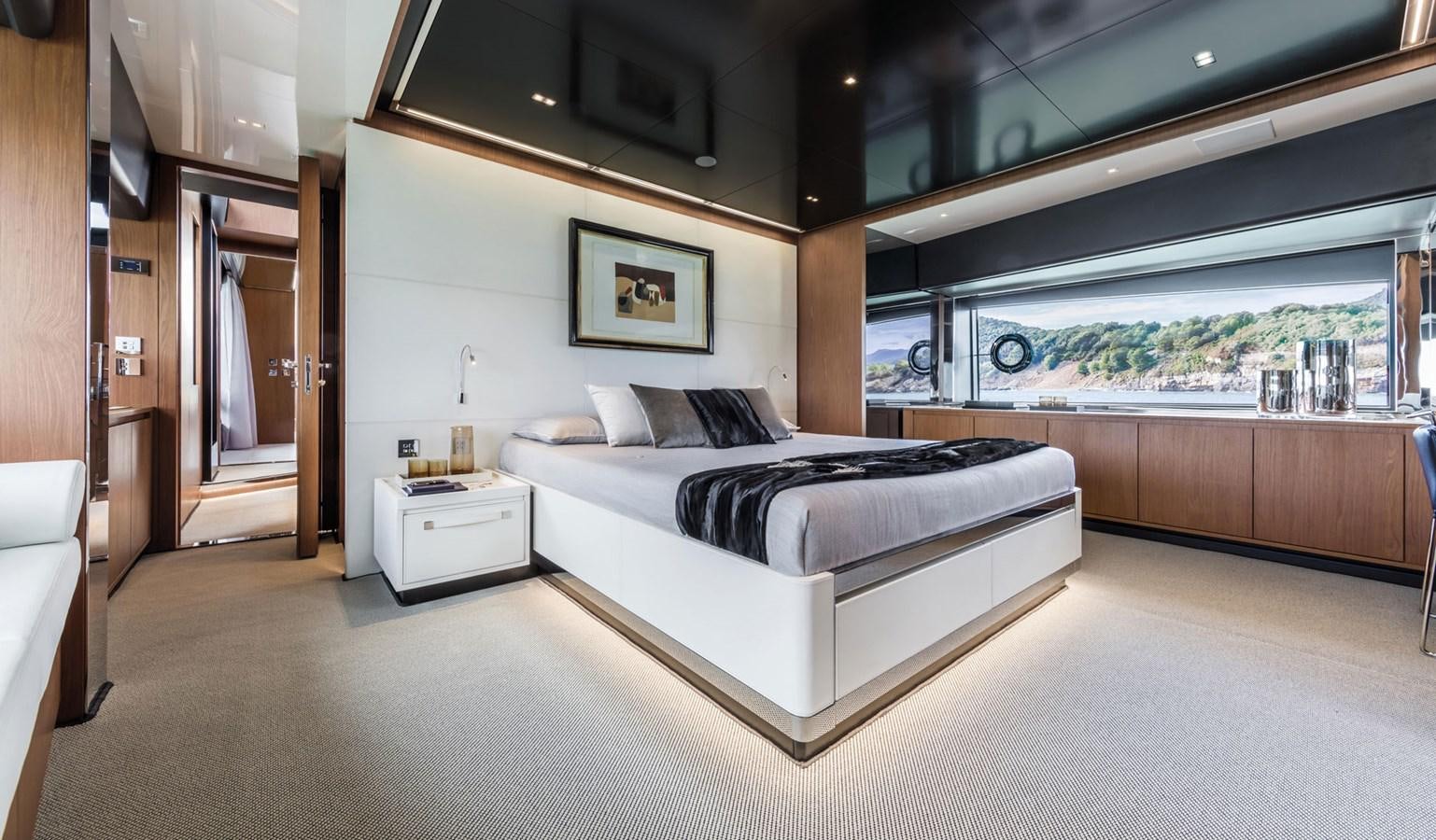 a room with a bed and a desk aboard UNDISCLOSED Yacht for Sale