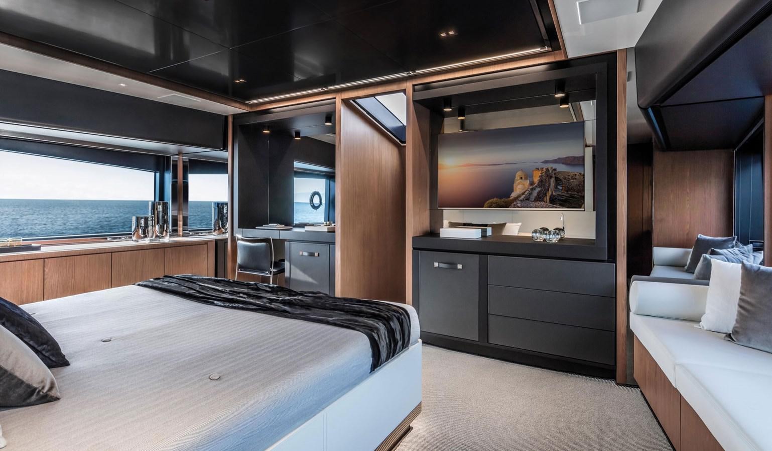 a room with a bed and a tv aboard UNDISCLOSED Yacht for Sale