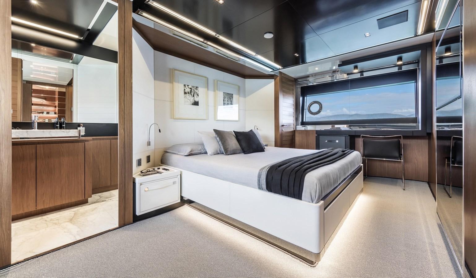 a room with a bed and a tv aboard UNDISCLOSED Yacht for Sale