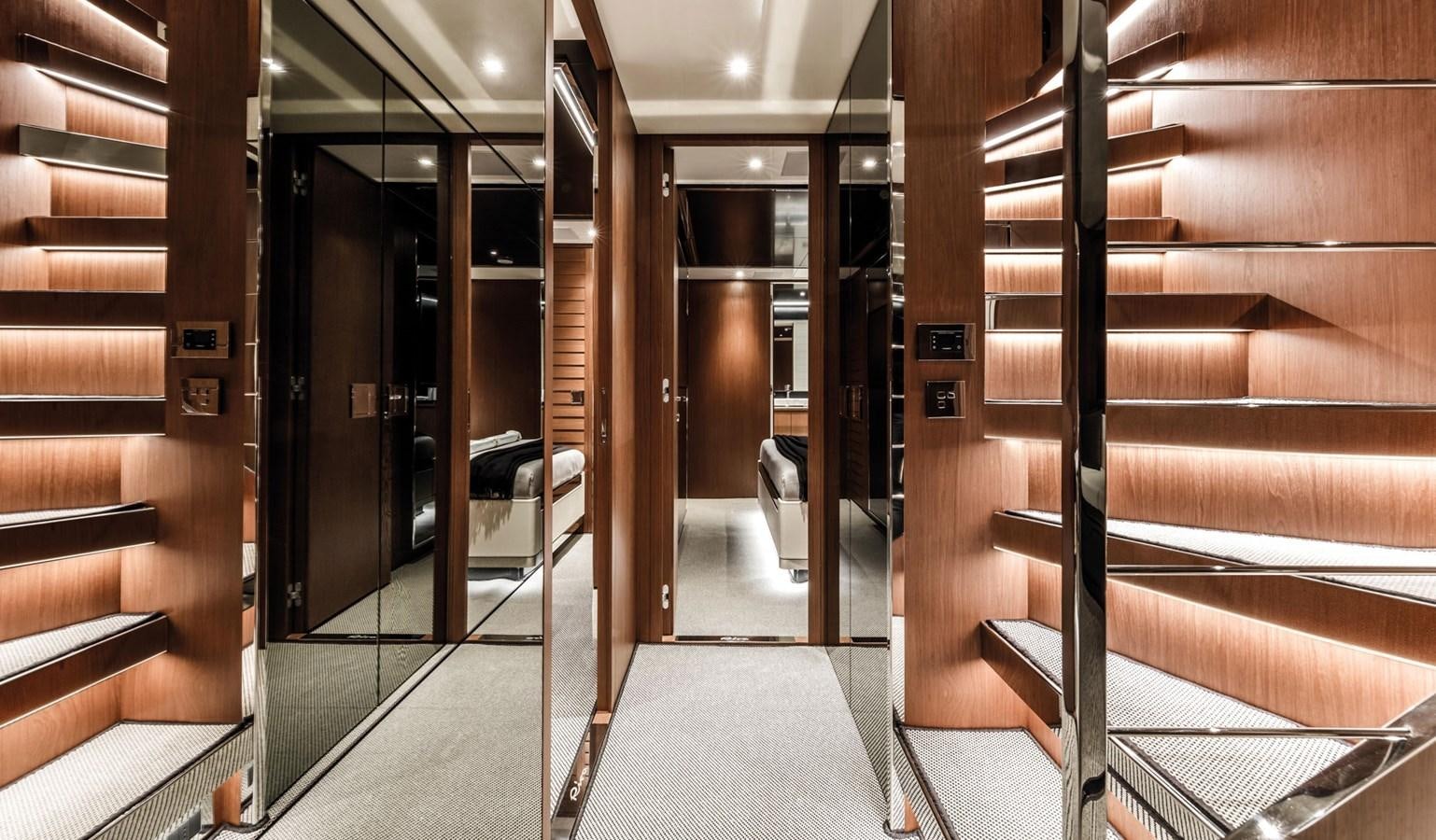 a room with wooden walls and a staircase aboard UNDISCLOSED Yacht for Sale
