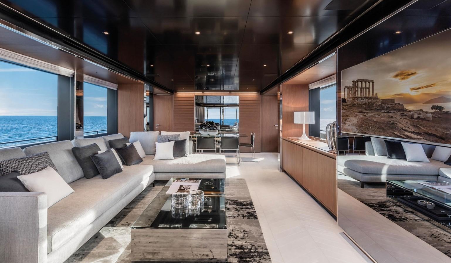 a living room with a large window aboard UNDISCLOSED Yacht for Sale
