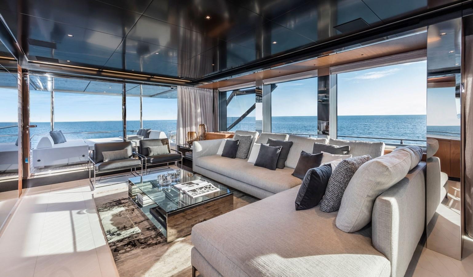 a living room with a large window aboard UNDISCLOSED Yacht for Sale