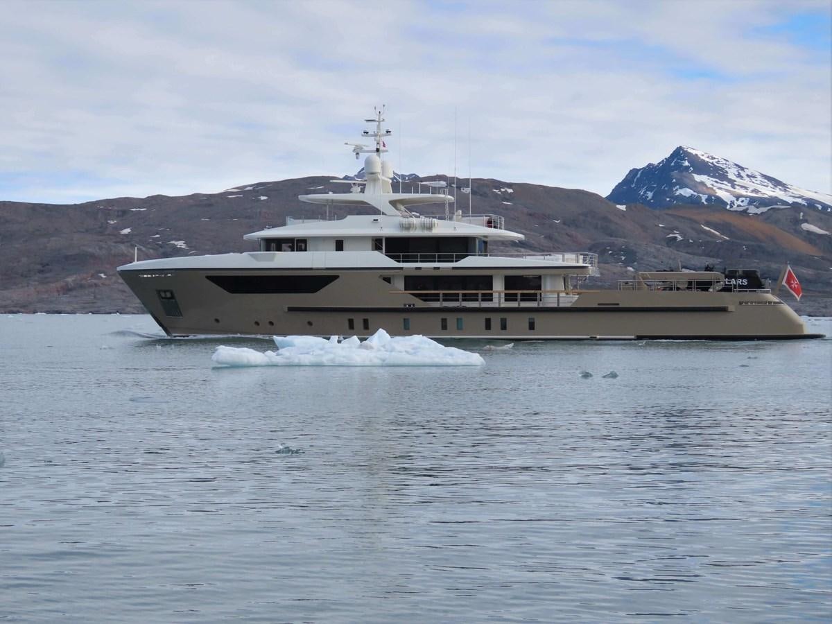 a large ship in the water aboard AMIKA Yacht for Sale