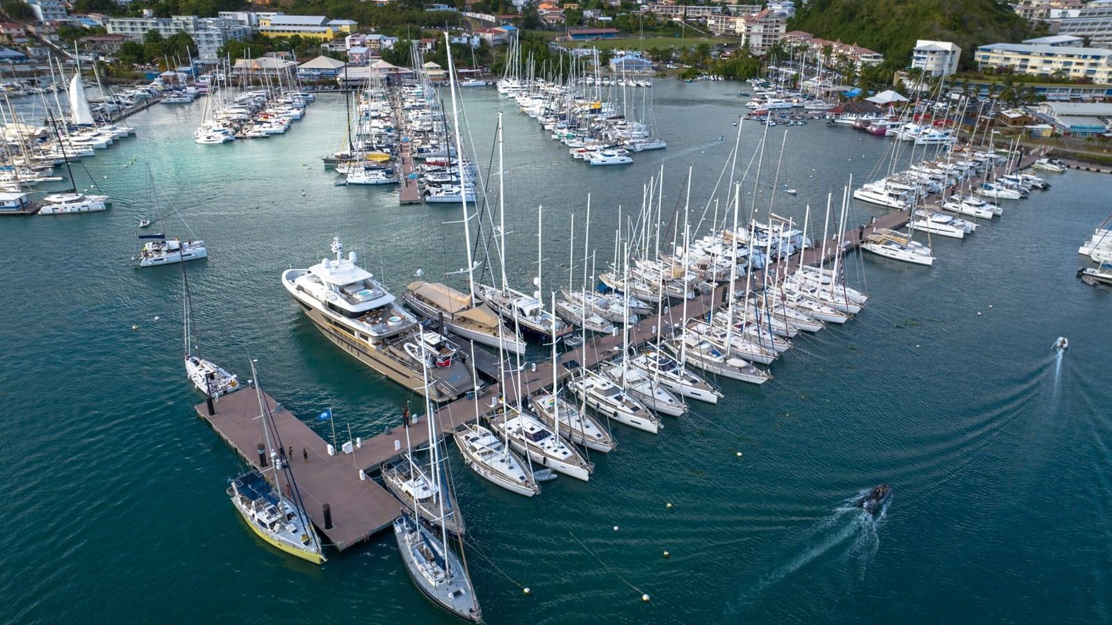 a group of boats in a harbor aboard AMIKA Yacht for Sale