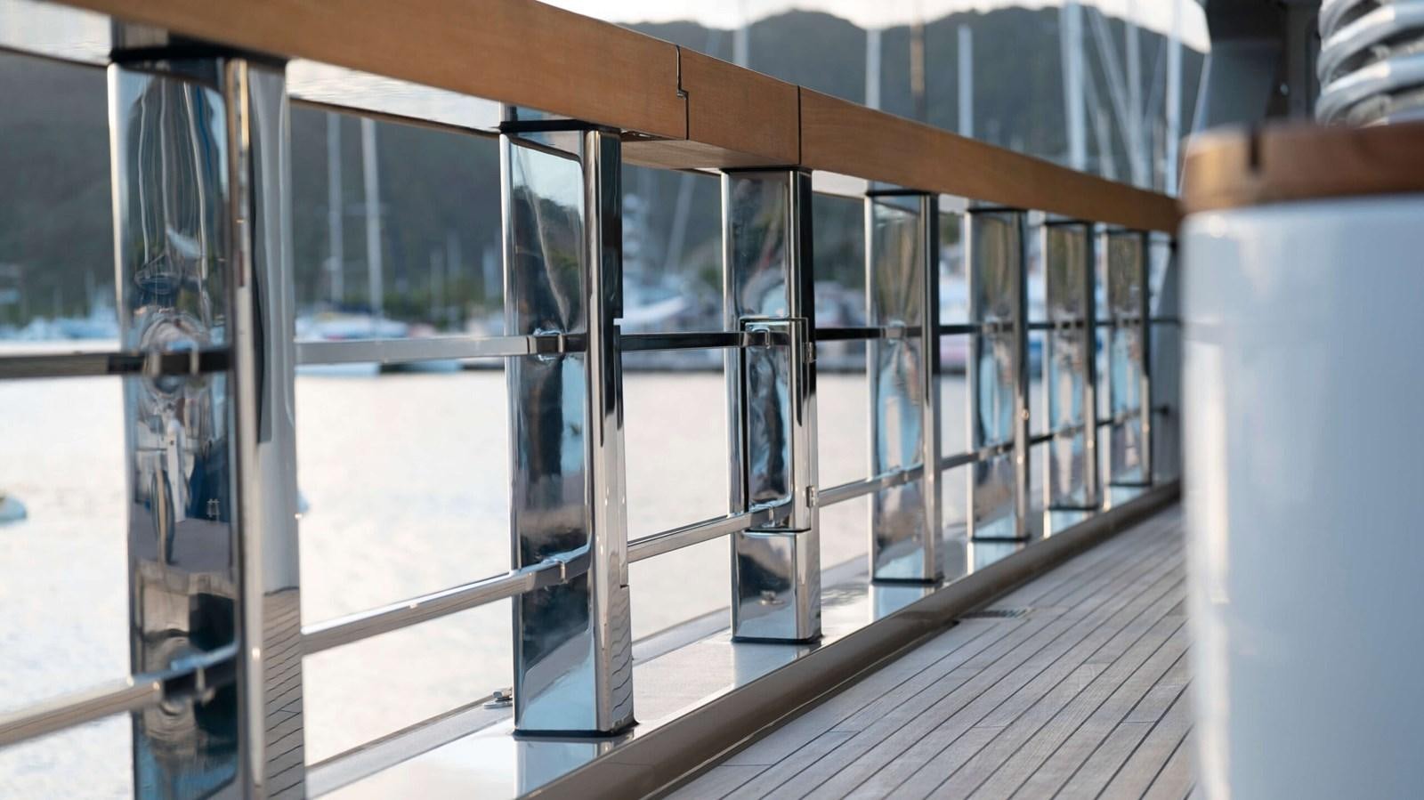 a glass door with glass walls aboard AMIKA Yacht for Sale