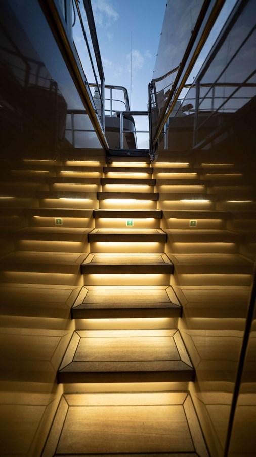 a close-up of a staircase aboard AMIKA Yacht for Sale